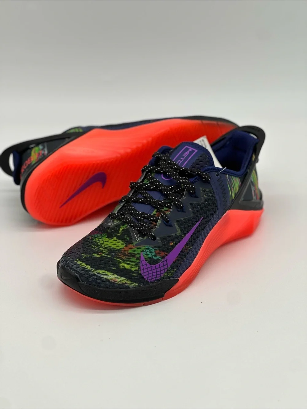 Nike Women's Multicolor Knit Sneakers with Purple Swoosh and Bright Orange Sole